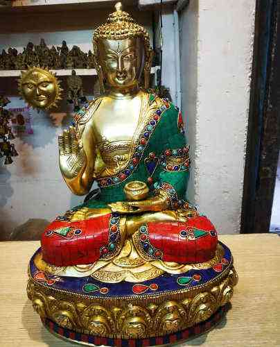 Buddha Brass Statue with Stonework